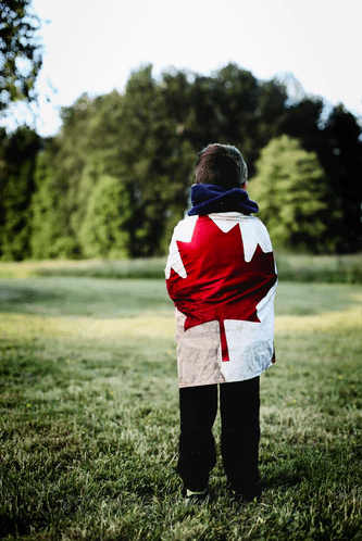 boy with maple leaf shirt